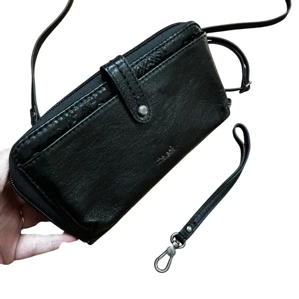 THE SAK black leather clutch purse wristlet crossbody bag zip around wallet
